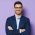 business-male-isolated-on-purple-background-9D2UWG3